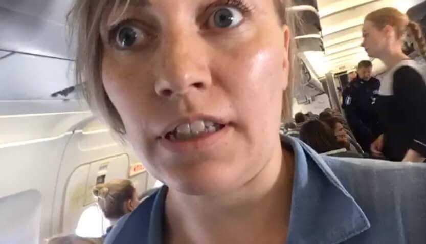 Finsk asylaktivist försökte stoppa plan med utvisad migrant på – fördes av planet av polis