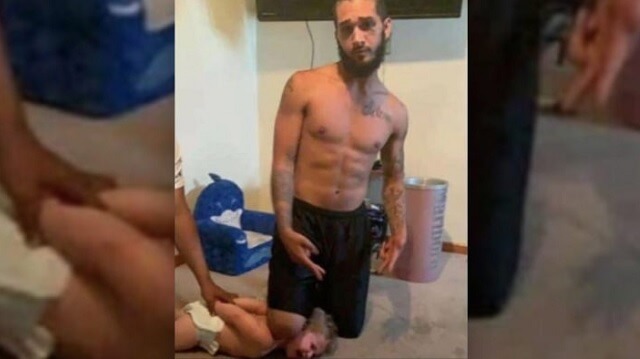 BLM-aktivist arresterad efter att ha poserat med benet mot vitt barns nacke