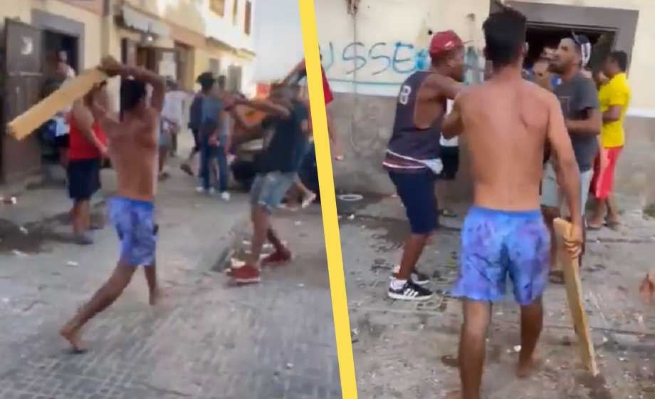 VIDEO: Migranter i jätteslagsmål med påkar